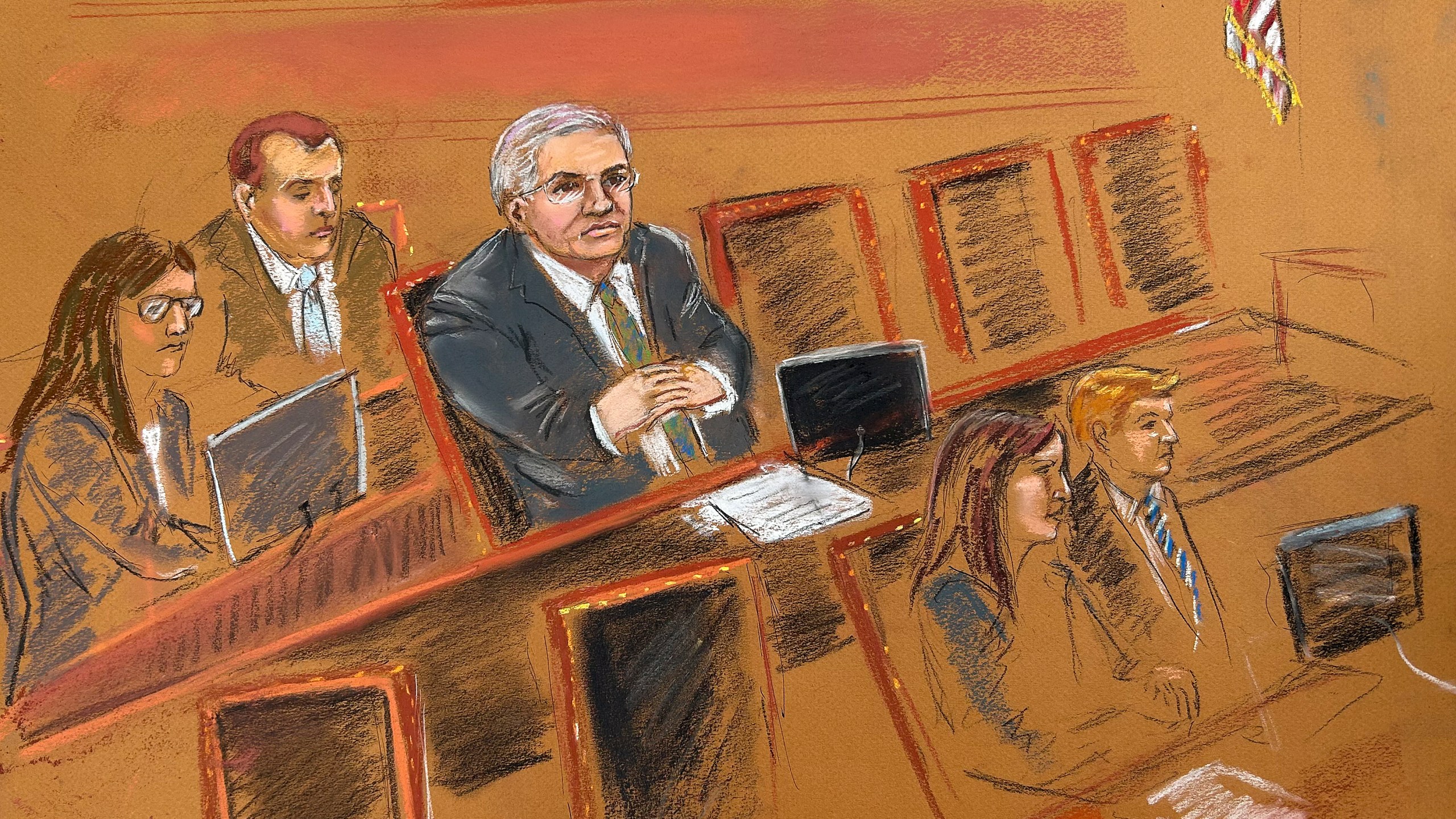 Sen. Bob Menendez, center, sits with his defense team during jury selection, Tuesday, May 14, 2024, at Manhattan federal court in New York. Menendez, a Democrat, is accused of accepting bribes of gold and cash to use his influence to deliver favors that would help three New Jersey businessmen. (Candace E. Eaton via AP)