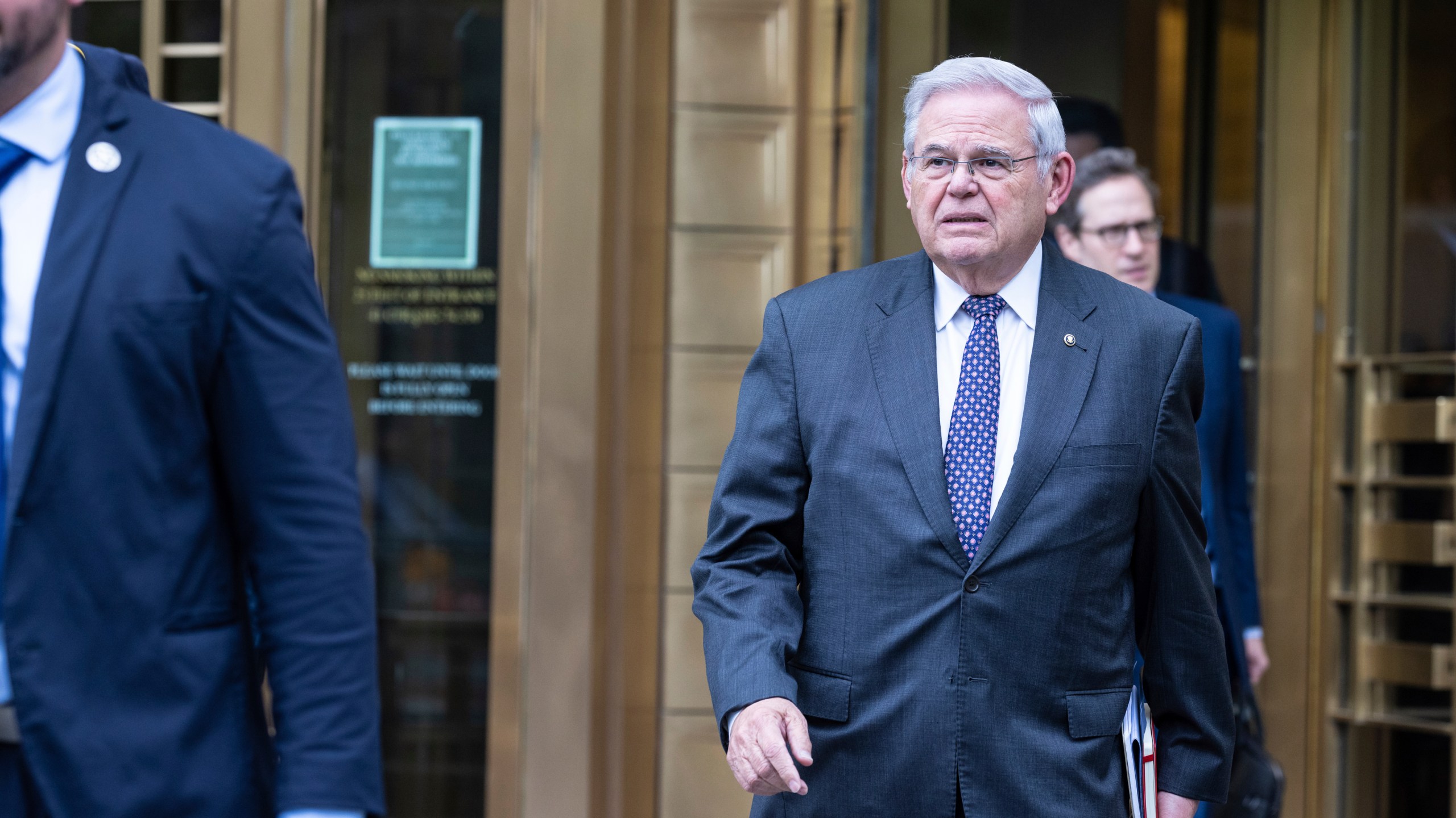U.S. Sen. Bob Menendez, D-N.J., leaves Manhattan federal court after the second day of jury selection in his trial, Tuesday, May 14, 2024, in New York. The Democrat has pleaded not guilty to bribery, extortion, fraud and obstruction of justice, along with acting as a foreign agent of Egypt. (AP Photo/Stefan Jeremiah)