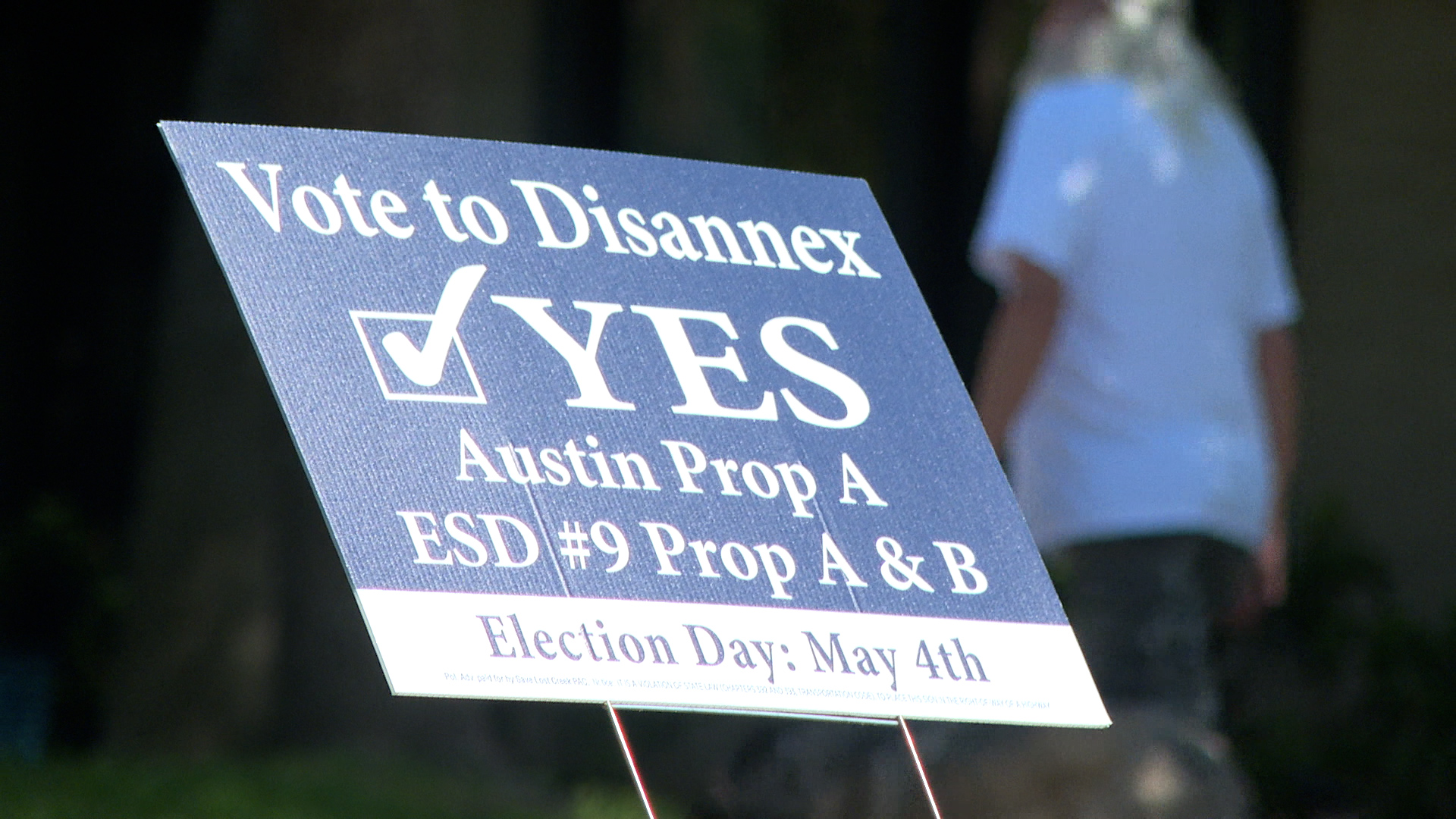 A sign encouraging people to vote for disannexation in Lost Creek