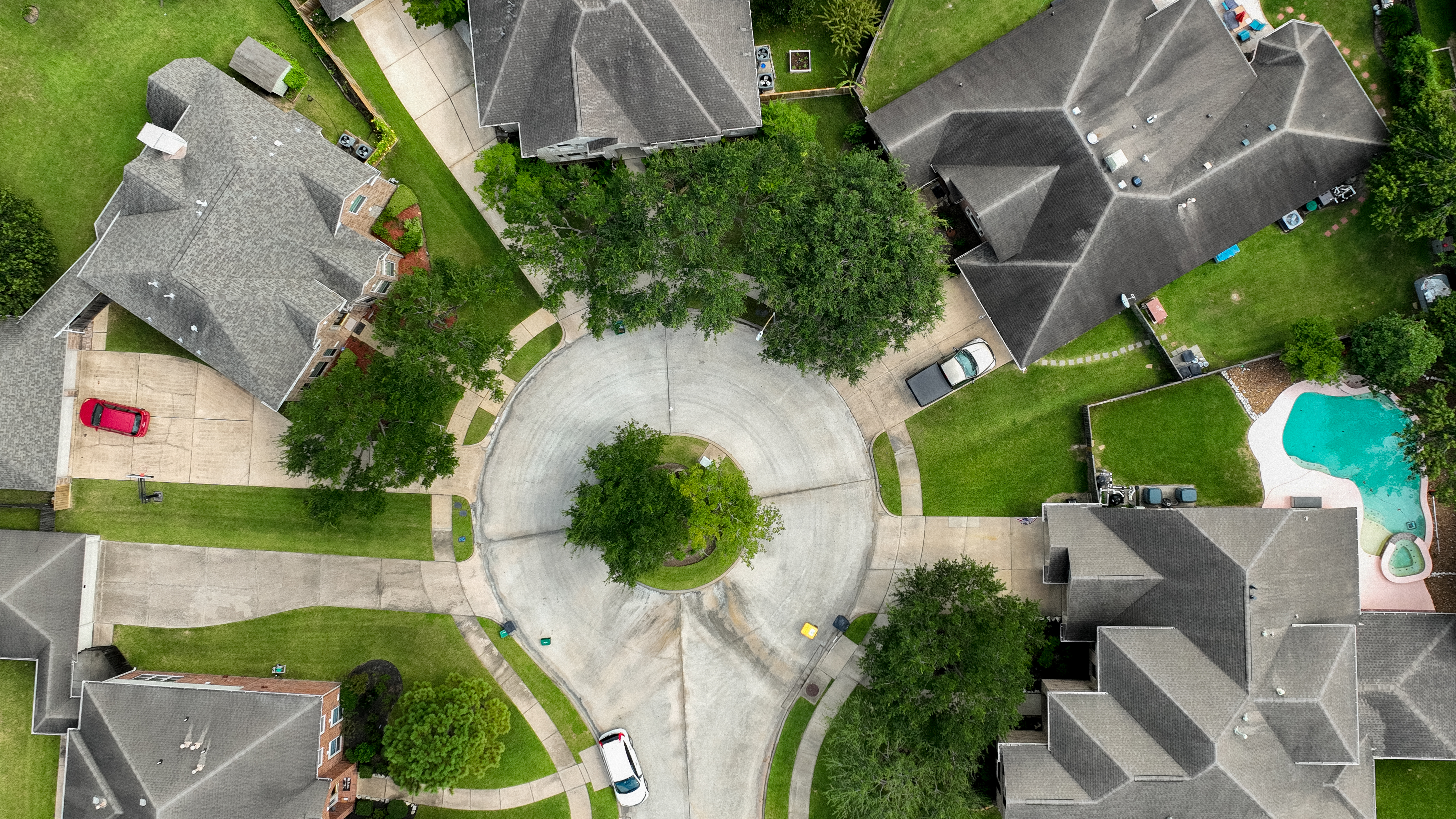 In an aerial view, homes are seen in a residential neighborhood on September 15, 2022 in Pearland, Texas. (Photo by Brandon Bell/Getty Images)