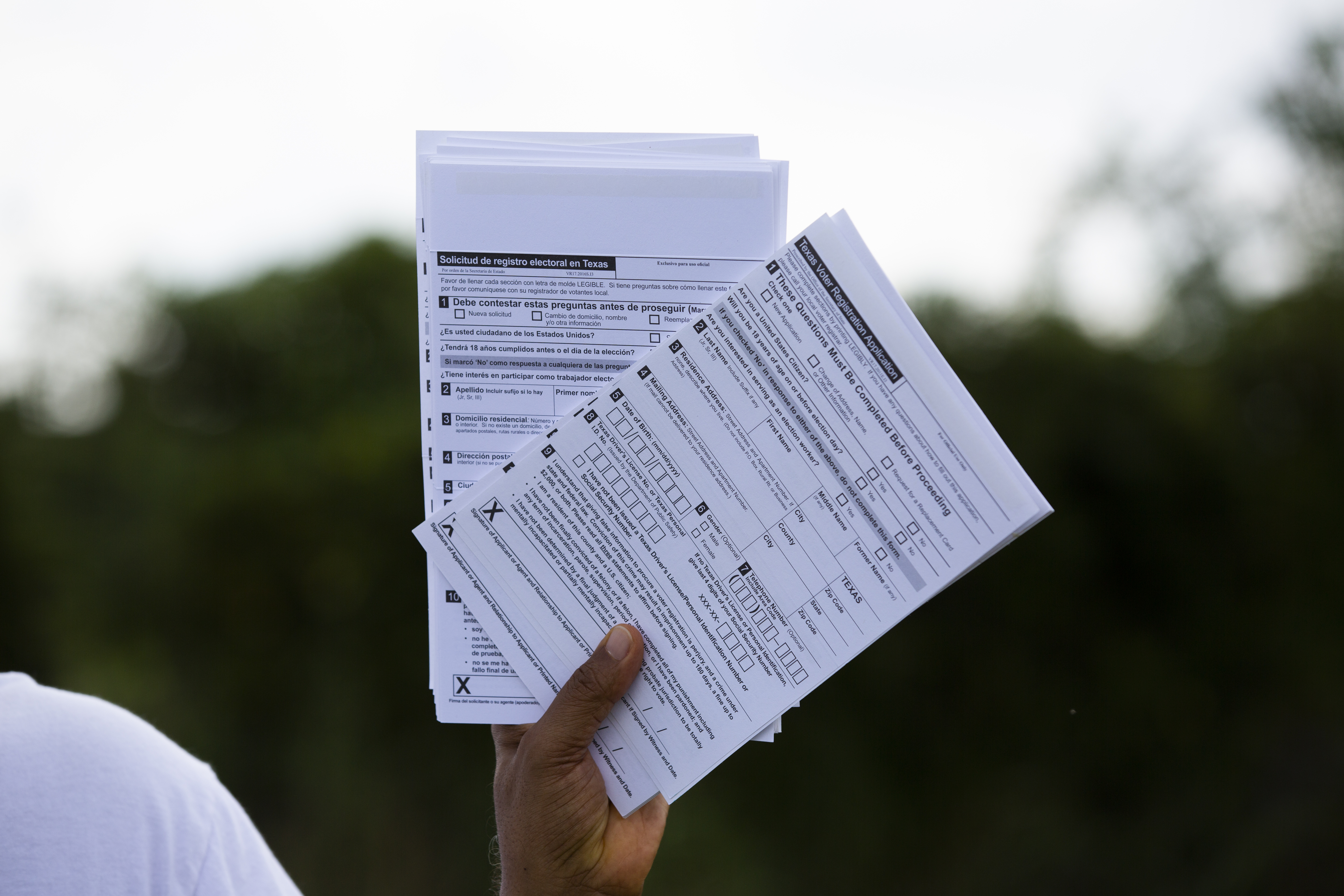 Texas voter registration applications for distribution at a food distribution event, Friday, Sept. 25, 2020, in Houston. (Photo by Marie D. De Jesus/Houston Chronicle via Getty Images)
