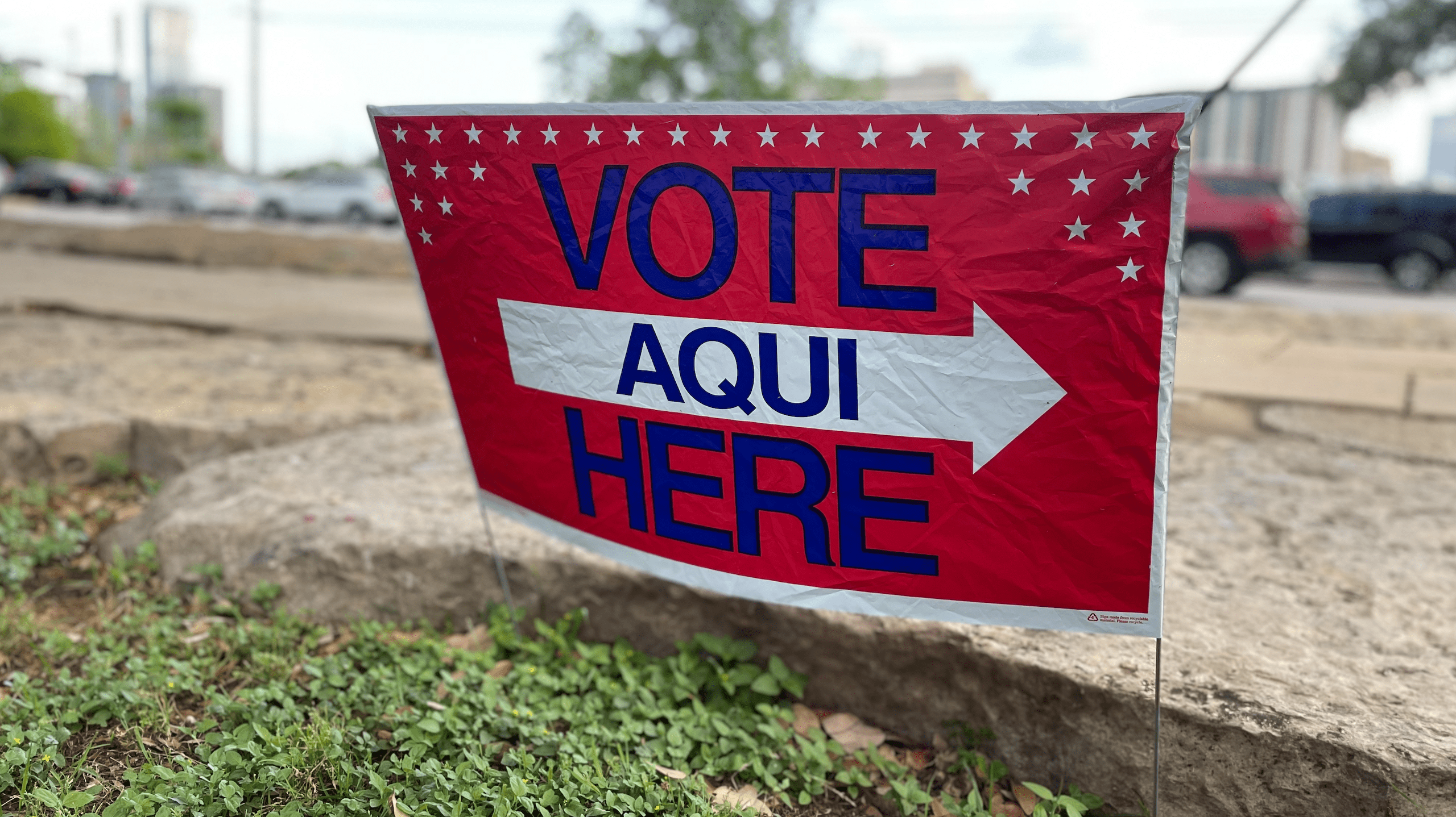 Photo of a vote here sign