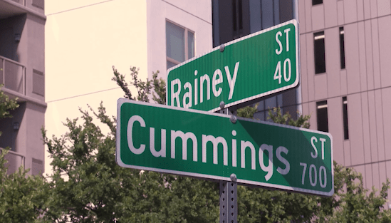 The corner of Rainey and Cummings Streets is on the south side of Rainey, near Lady Bird Lake.